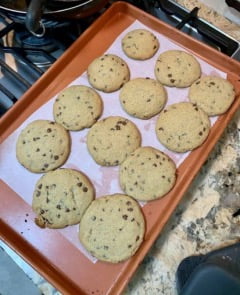 Photo of a tray of chocolate chip cookies